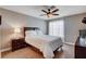 This bedroom has a ceiling fan, neutral walls, and updated flooring at 4860 Nara Vista Way # 204, Las Vegas, NV 89103
