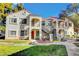 Well-maintained building with colorful landscaping and stairs leading to upper-level units at 4860 Nara Vista Way # 204, Las Vegas, NV 89103
