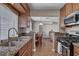 Open concept kitchen featuring granite countertops and stainless steel appliances at 4860 Nara Vista Way # 204, Las Vegas, NV 89103