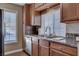Close-up of the kitchen sink with stainless steel appliances and granite countertops at 4860 Nara Vista Way # 204, Las Vegas, NV 89103