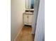 Bathroom with updated vanity, brushed nickel faucet, and modern lighting at 5029 Spencer St # D, Las Vegas, NV 89119