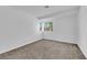 Neutral bedroom with carpet, a window and a closet at 5029 Spencer St # D, Las Vegas, NV 89119