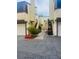 Exterior of a condo featuring stucco, private garages and stairs to the upper levels at 5029 Spencer St # D, Las Vegas, NV 89119