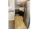 Kitchen features modern stainless appliances, granite countertops, and cherry cabinets at 5029 Spencer St # D, Las Vegas, NV 89119
