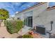 Cozy backyard patio with lush greenery, perfect for outdoor dining and relaxation at 5171 Briar Patch Way, Las Vegas, NV 89118