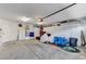 Well-organized garage with ample storage cabinets and overhead lighting at 5171 Briar Patch Way, Las Vegas, NV 89118
