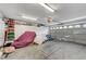 Spacious garage with ample storage and a functional garage door at 5171 Briar Patch Way, Las Vegas, NV 89118