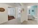 Hallway view with an entry into a full bath and an entry into a bedroom with closet at 5171 Briar Patch Way, Las Vegas, NV 89118