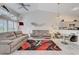 Spacious living room with vaulted ceilings, modern decor, and an open concept design at 5171 Briar Patch Way, Las Vegas, NV 89118