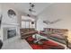 Inviting living room features a fireplace, modern decor, and comfortable seating arrangements at 5171 Briar Patch Way, Las Vegas, NV 89118