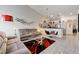 Open floor plan showcasing the living room connected to the kitchen and dining area at 5171 Briar Patch Way, Las Vegas, NV 89118