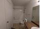 Bathroom featuring a bathtub, toilet, sink, and vanity mirror at 555 E Silverado Ranch Blvd # 2147, Las Vegas, NV 89183