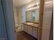 Bathroom with a shower, toilet, sink, and mirror at 555 E Silverado Ranch Blvd # 2147, Las Vegas, NV 89183
