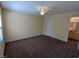 Bedroom with neutral walls, carpet flooring, and a ceiling fan, showcasing a cozy atmosphere at 555 E Silverado Ranch Blvd # 2147, Las Vegas, NV 89183