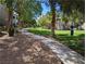 Walking path through the community's well-manicured green spaces at 555 E Silverado Ranch Blvd # 2147, Las Vegas, NV 89183