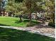 Common community area with picnic tables, seating, and mature landscaping at 555 E Silverado Ranch Blvd # 2147, Las Vegas, NV 89183