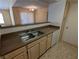 Practical kitchen with a double sink, ample counter space, and essential appliances offering functionality at 555 E Silverado Ranch Blvd # 2147, Las Vegas, NV 89183