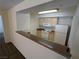 A view into the kitchen with a breakfast bar offering a glimpse of appliances and countertop space at 555 E Silverado Ranch Blvd # 2147, Las Vegas, NV 89183