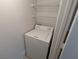 Laundry closet with washer and shelves for storing laundry supplies at 555 E Silverado Ranch Blvd # 2147, Las Vegas, NV 89183