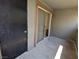 View of private patio with sliding glass door and extra storage closet at 555 E Silverado Ranch Blvd # 2147, Las Vegas, NV 89183