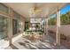 Beautiful covered patio with seating, overlooking the lush backyard at 6141 Markleham Ave, Las Vegas, NV 89130