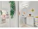 Powder room with a pedestal sink and a view of another room at 6141 Markleham Ave, Las Vegas, NV 89130