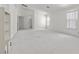 Spacious bedroom with high ceilings and neutral color palette at 6141 Markleham Ave, Las Vegas, NV 89130