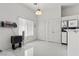Cozy dining area with natural light, tile flooring, and white color palette at 6141 Markleham Ave, Las Vegas, NV 89130