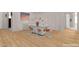 A virtual staged dining room with a white table, orange seated chairs, and hardwood floors for a modern look at 6141 Markleham Ave, Las Vegas, NV 89130