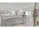 Open kitchen featuring counter seating and views of adjacent living spaces at 6141 Markleham Ave, Las Vegas, NV 89130