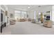 Expansive living room with multiple seating areas and plenty of natural light at 6141 Markleham Ave, Las Vegas, NV 89130