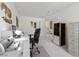 Well-lit office space with a comfortable desk and chair, featuring natural light and ample storage, perfect for productivity at 6141 Markleham Ave, Las Vegas, NV 89130