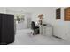 Bright home office with a modern desk, comfortable chair, and ample natural light, creating a perfect workspace at 6141 Markleham Ave, Las Vegas, NV 89130