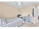 Comfortable bedroom with soft lighting and an inviting atmosphere with ceiling fan at 7115 Hickory Post Ave, Las Vegas, NV 89179