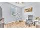 Bedroom with natural light from a window, and exercise equipment at 7115 Hickory Post Ave, Las Vegas, NV 89179