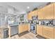 Well-equipped kitchen featuring stainless steel appliances and lots of counter space at 7115 Hickory Post Ave, Las Vegas, NV 89179