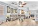 Open-concept living room featuring hardwood floors and comfortable seating at 7115 Hickory Post Ave, Las Vegas, NV 89179