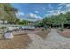 Spacious backyard with a patio and desert landscaping at 7140 Palmyra Ave, Las Vegas, NV 89117