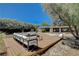 Secluded backyard deck area offering comfortable seating at 7140 Palmyra Ave, Las Vegas, NV 89117