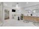 Stylish bathroom with modern fixtures, a walk-in closet, and a soaking tub, creating a spa-like ambiance at 7140 Palmyra Ave, Las Vegas, NV 89117