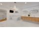 Large bathroom with a freestanding tub, double vanity, and custom cabinets at 7140 Palmyra Ave, Las Vegas, NV 89117
