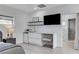 Cozy bedroom featuring a kitchenette, sleek design, and direct access to a luxurious bathroom at 7140 Palmyra Ave, Las Vegas, NV 89117