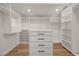 Well-organized walk-in closet with custom shelving, drawers, and ample storage space for clothing and accessories at 7140 Palmyra Ave, Las Vegas, NV 89117