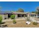 Beautiful single-story home featuring desert landscaping and solar panels at 7140 Palmyra Ave, Las Vegas, NV 89117