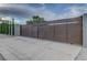Modern gate at the front of the property providing privacy and security at 7140 Palmyra Ave, Las Vegas, NV 89117