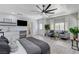 Spacious main bedroom features a sitting area, kitchenette, and large windows at 7140 Palmyra Ave, Las Vegas, NV 89117