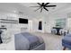 Bright main bedroom featuring a kitchenette, sleek furniture, and ample natural light at 7140 Palmyra Ave, Las Vegas, NV 89117