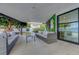 Relaxing covered outdoor patio with comfortable seating, perfect for entertaining guests at 7140 Palmyra Ave, Las Vegas, NV 89117