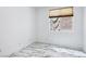 Bright bedroom featuring marble flooring and a window with stylish blinds at 7331 Carrot Ridge St, Las Vegas, NV 89139