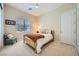 A cozy bedroom with a comfy bed, plush chair, and a large window is perfect for rest and relaxation at 7340 Zonal Ave, Las Vegas, NV 89131
